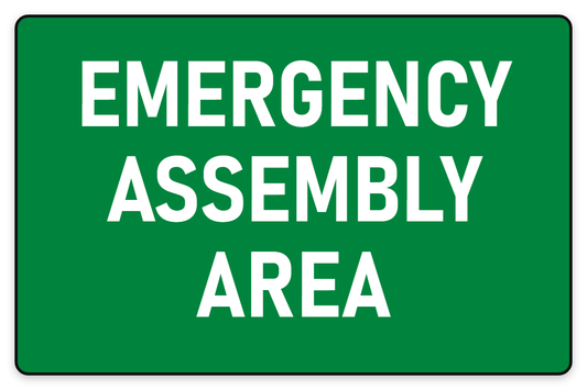 Emergency Assembly Area sign white text on green